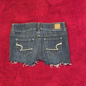 American Eagle dark blue low-waisted denim shorts. Size 0.